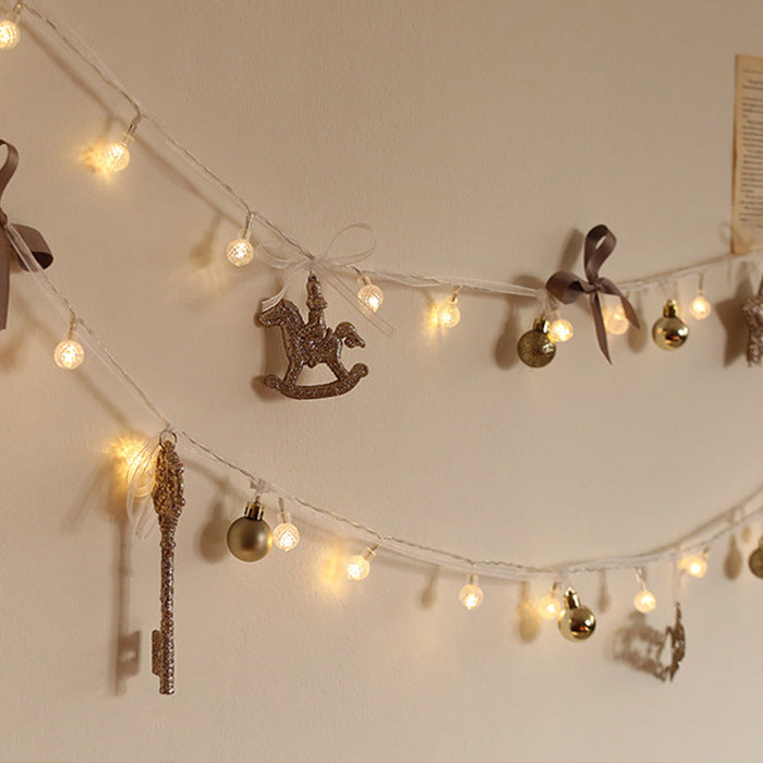 Illuminated Christmas wreath with LED string lights