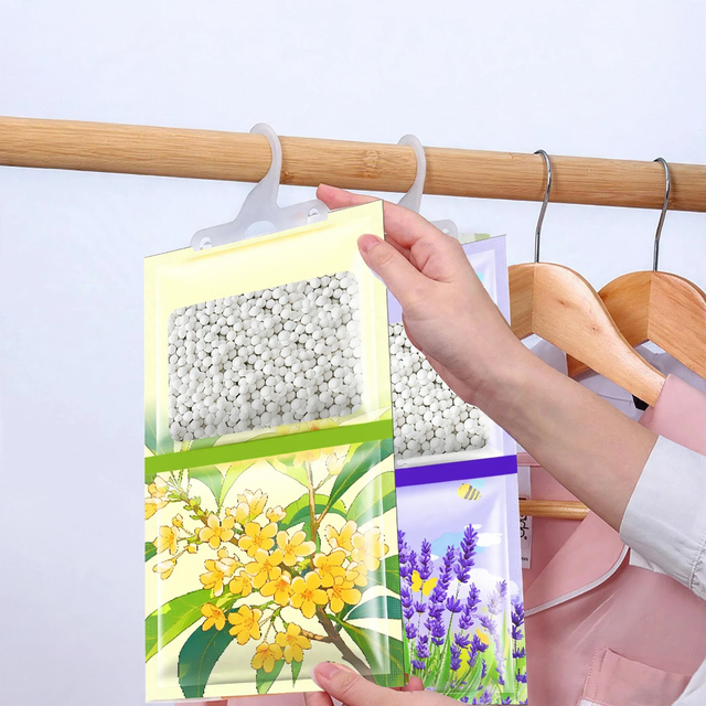 Hanging fragrance dehumidifier for wardrobes
