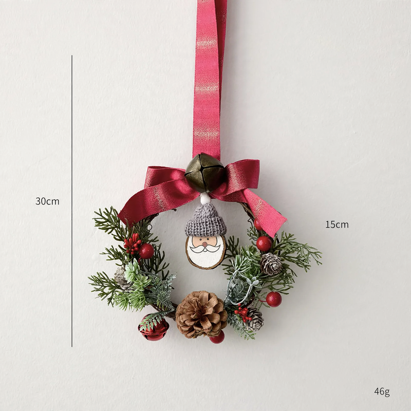 Mini Christmas wreath with pine cones and bells