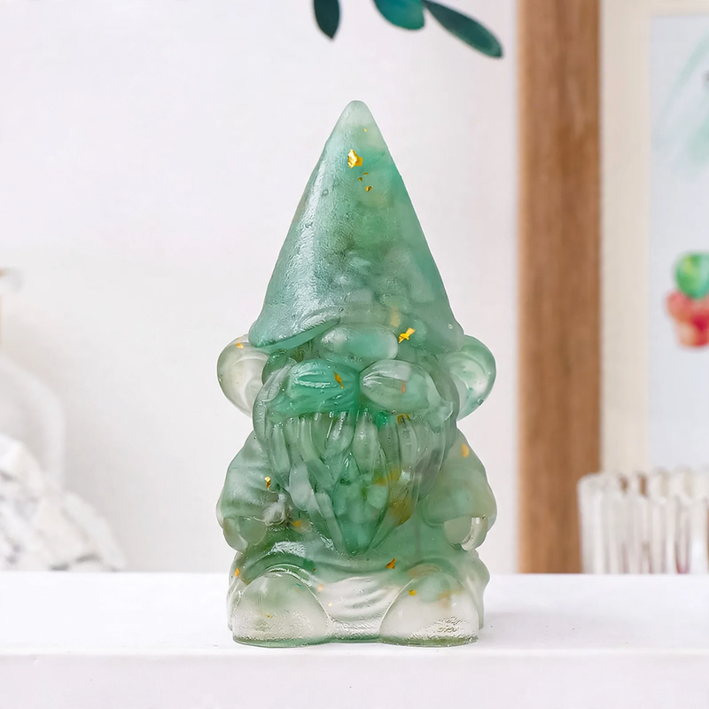 Dwarf figure made of resin with gemstones