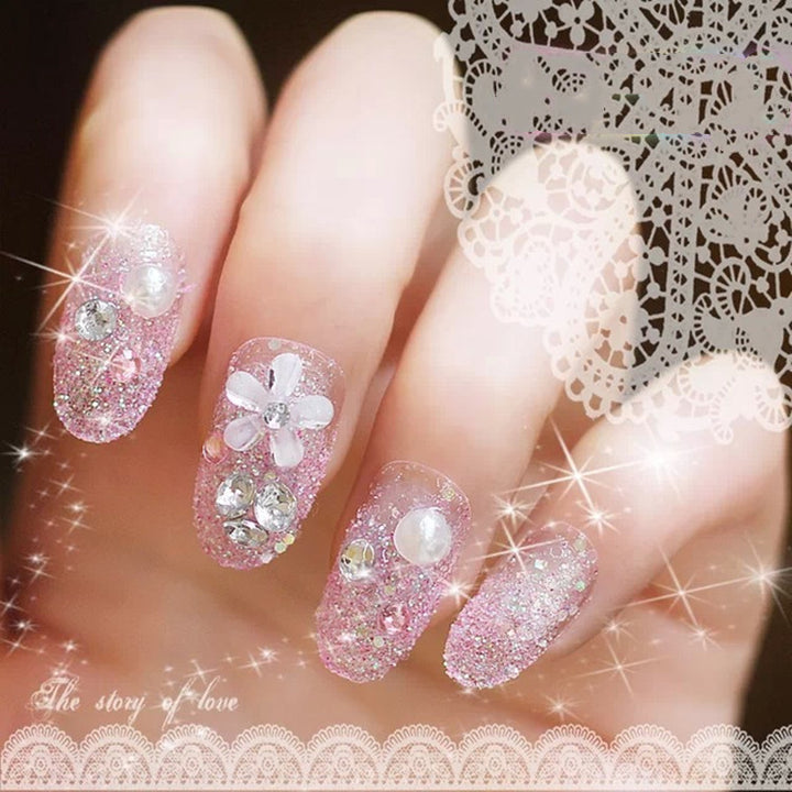 Artificial nails with delicate floral decorations Stornfield