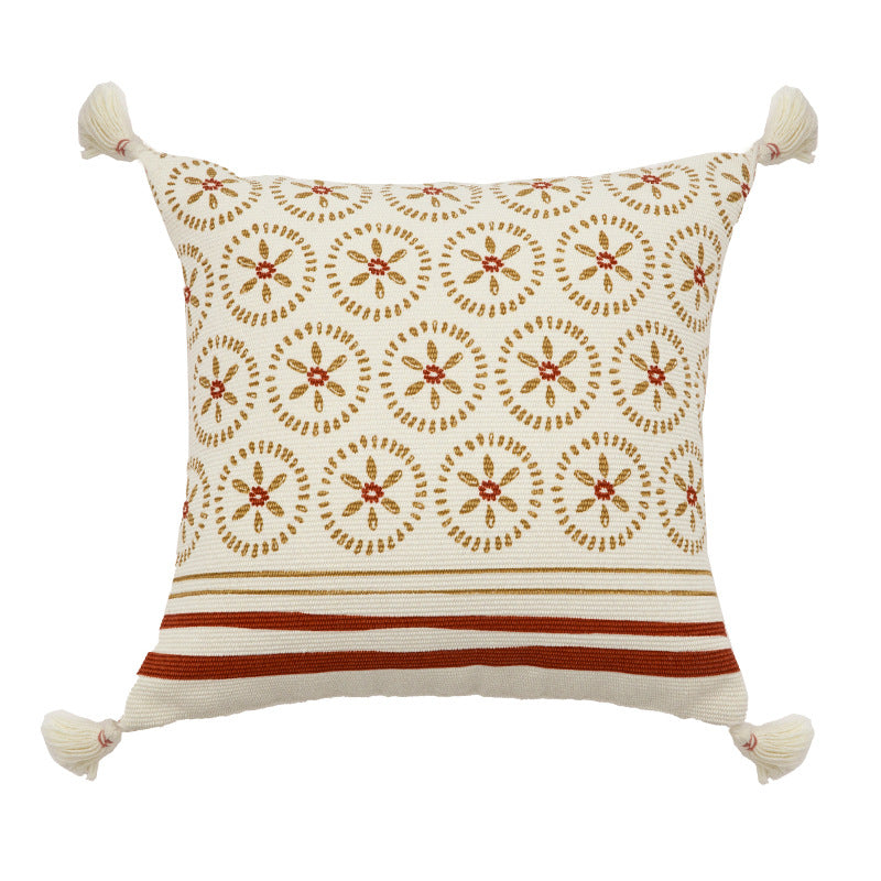 Decorative cushion cover with woven medallion pattern and tassels Stornfield