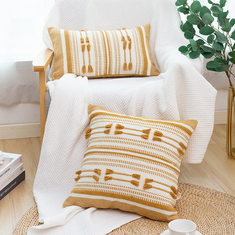 Handwoven square decorative cushion cover with tuft appliqués and boho stripes