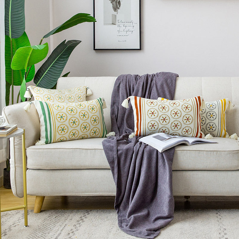 Decorative cushion cover with woven medallion pattern and tassels Stornfield