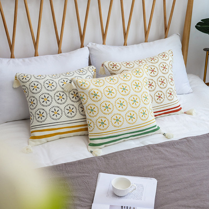 Decorative cushion cover with woven medallion pattern and tassels Stornfield