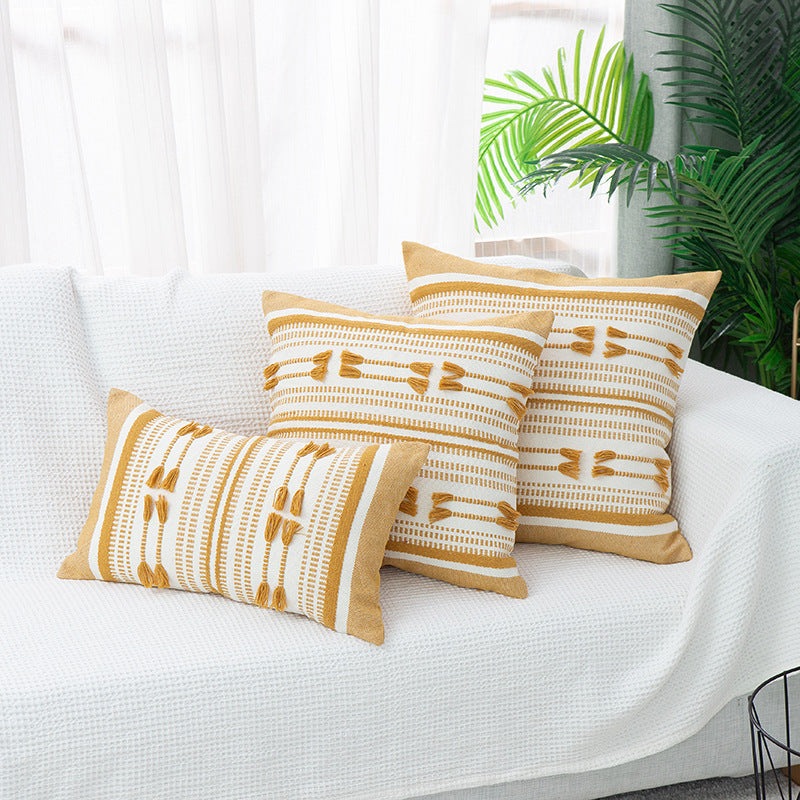 Handwoven square decorative cushion cover with tuft appliqués and boho stripes