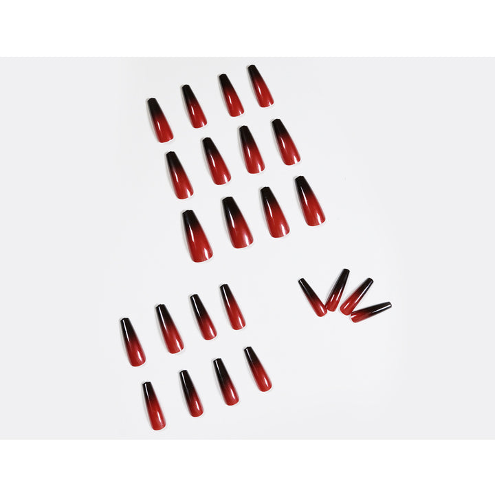 Artificial nail art in elegant stiletto design with glossy gradient colors Stornfield