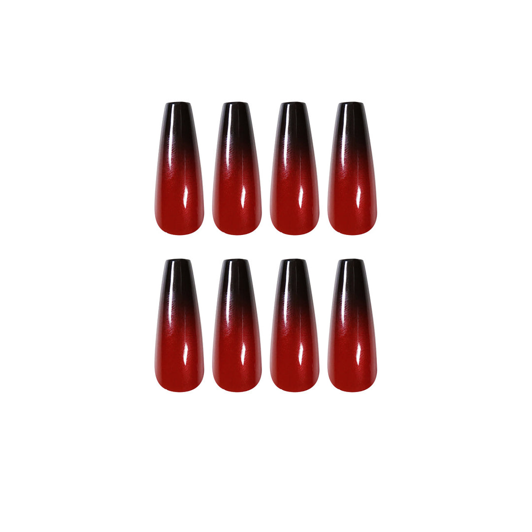 Artificial nail art in elegant stiletto design with glossy gradient colors Stornfield
