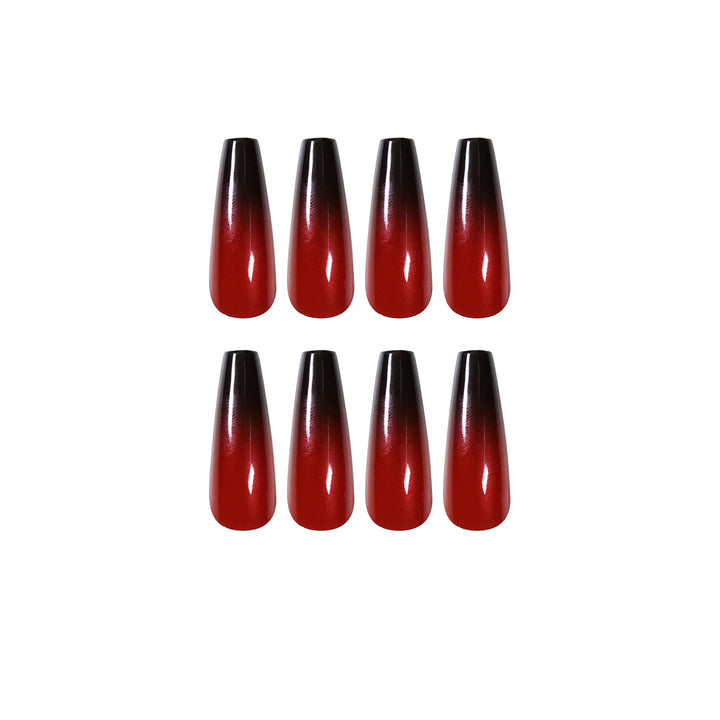 Artificial nail art in elegant stiletto design with glossy gradient colors Stornfield