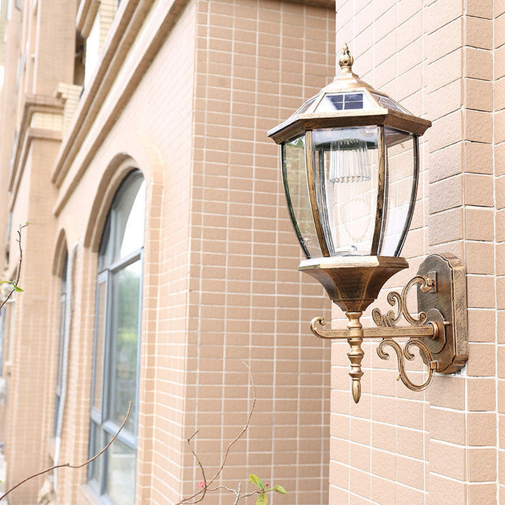 Stornfield | Vintage House-Shaped Solar Wall Lamp with Metal LED and Glass Shade for Outdoor Use