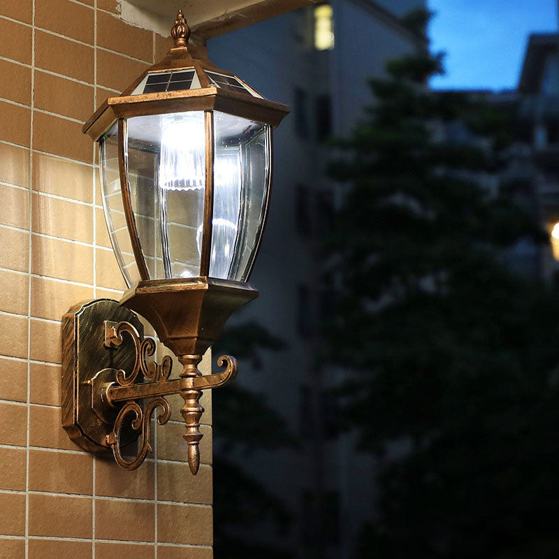 Stornfield | Vintage House-Shaped Solar Wall Lamp with Metal LED and Glass Shade for Outdoor Use