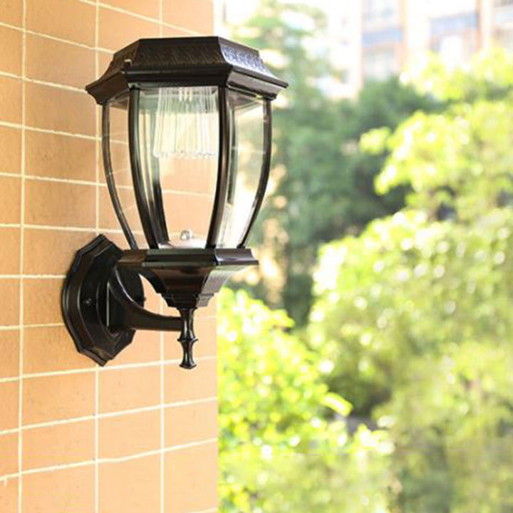 Stornfield | Vintage House-Shaped Solar Wall Lamp with Metal LED and Glass Shade for Outdoor Use