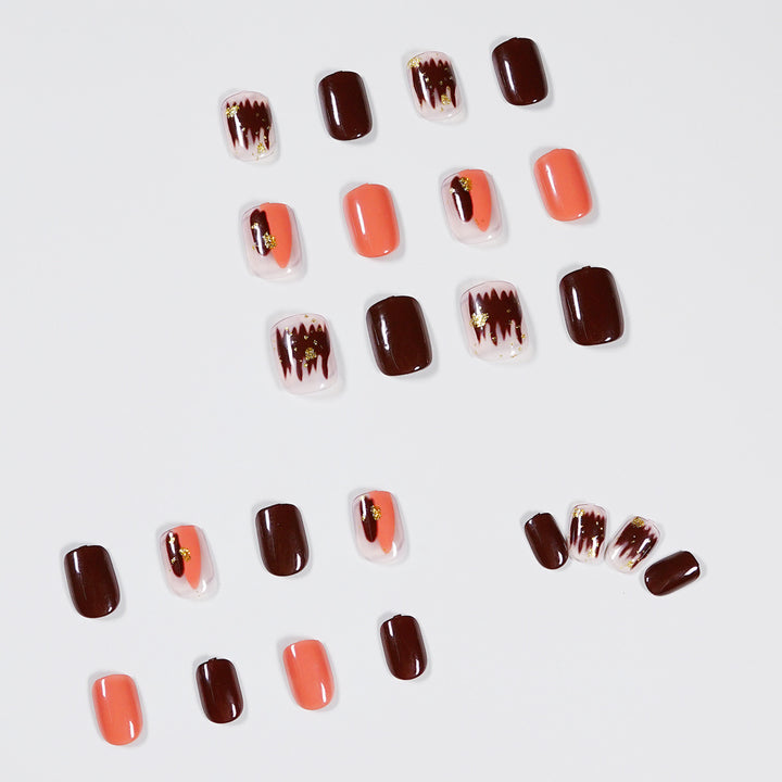 Artificial Nail Art with Gold Decorations Stornfield