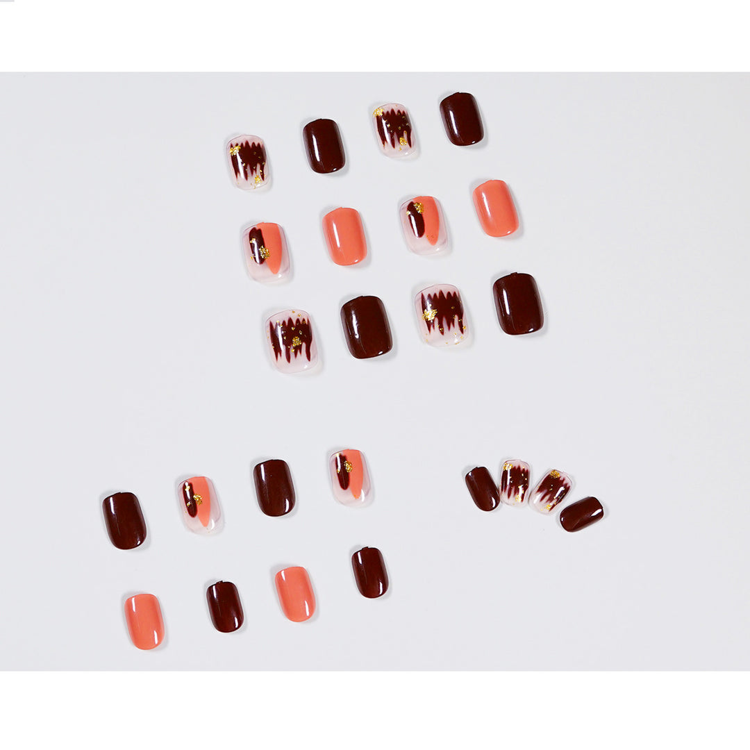 Artificial Nail Art with Gold Decorations Stornfield