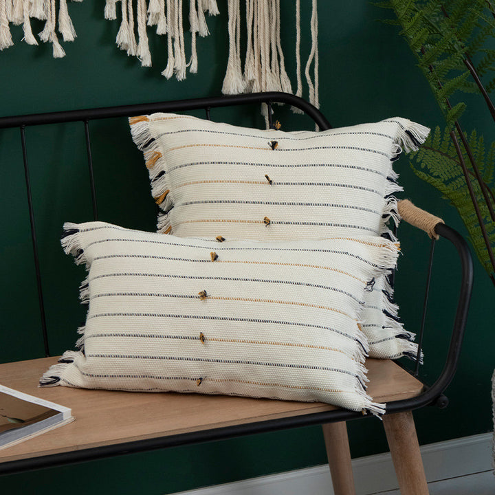 Decorative cotton cushion cover with striped tufted appearance and fringes