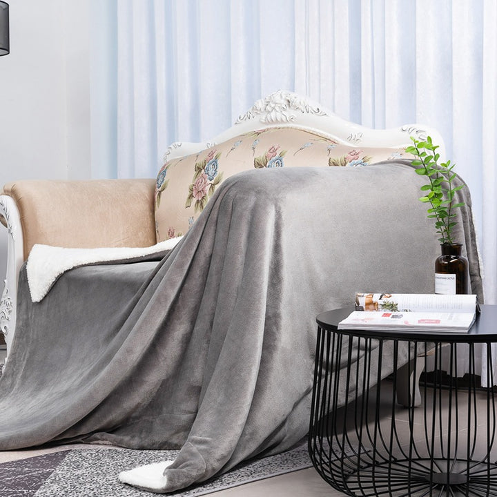 Women's reversible blanket in modern design with soft plush Stornfield