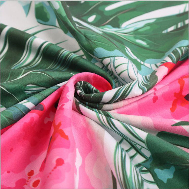Beach towel with tropical flamingo design Stornfield