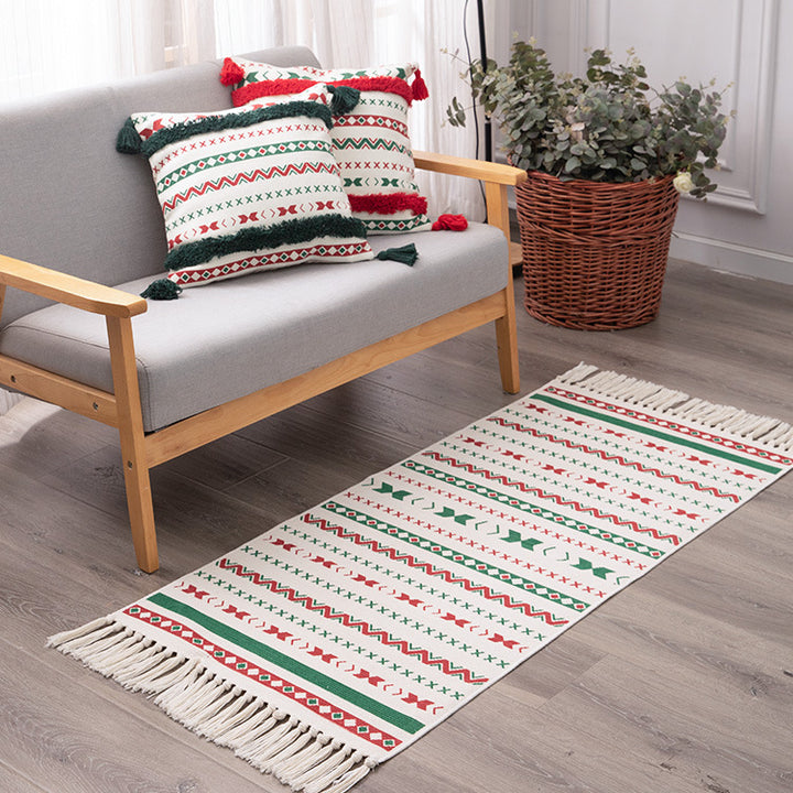 Flat-woven runner rug with Nordic Christmas pattern, tassels and cotton blend Stornfield