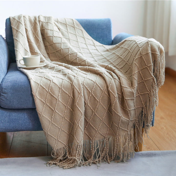 Women’s knitted blanket with textured wave pattern Stornfield