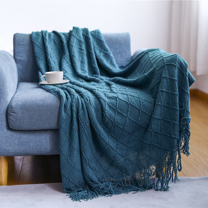 Women’s knitted blanket with textured wave pattern Stornfield