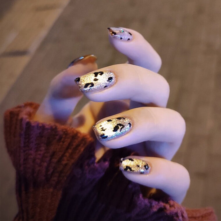 Glamorous nail art with glitter effects Stornfield