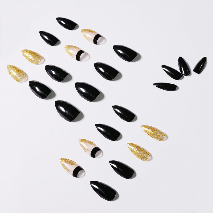 Artistic Nail Extensions with Black Gloss and Elegant Accents Stornfield