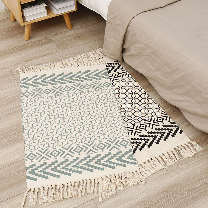 Flat-woven cotton runner with graphic stripe pattern and fringes Stornfield