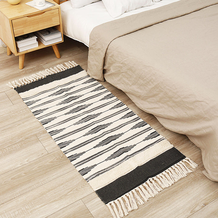 Flat-woven cotton runner with graphic stripe pattern and fringes Stornfield