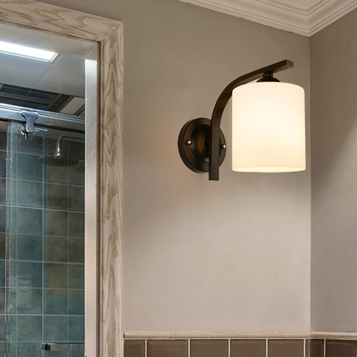 Cylindrical White Glass Wall Sconce Vintage 1 Head Aisle Wall Light with Curved Arm in Black | Stornfield
