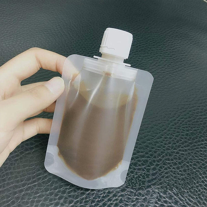 Portable Travel Fluid Dispensing Packing Bag | Stornfield