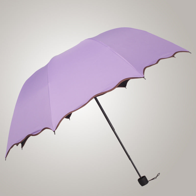 Women’s creative folding umbrella with elegant wave Stornfield