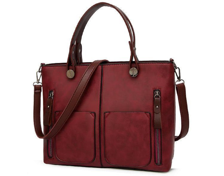 Cera - Vintage handbag with double front pocket | Stornfield