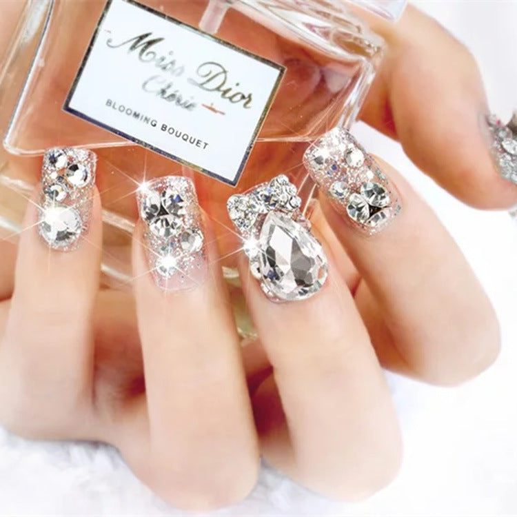 Nail art with glamorous rhinestone and glitter design Stornfield