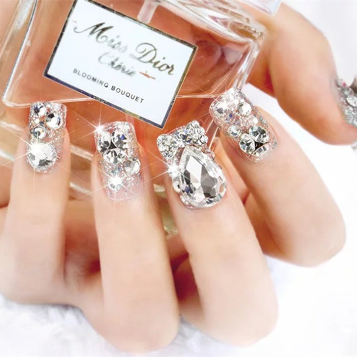 Nail art with glamorous rhinestone and glitter design Stornfield