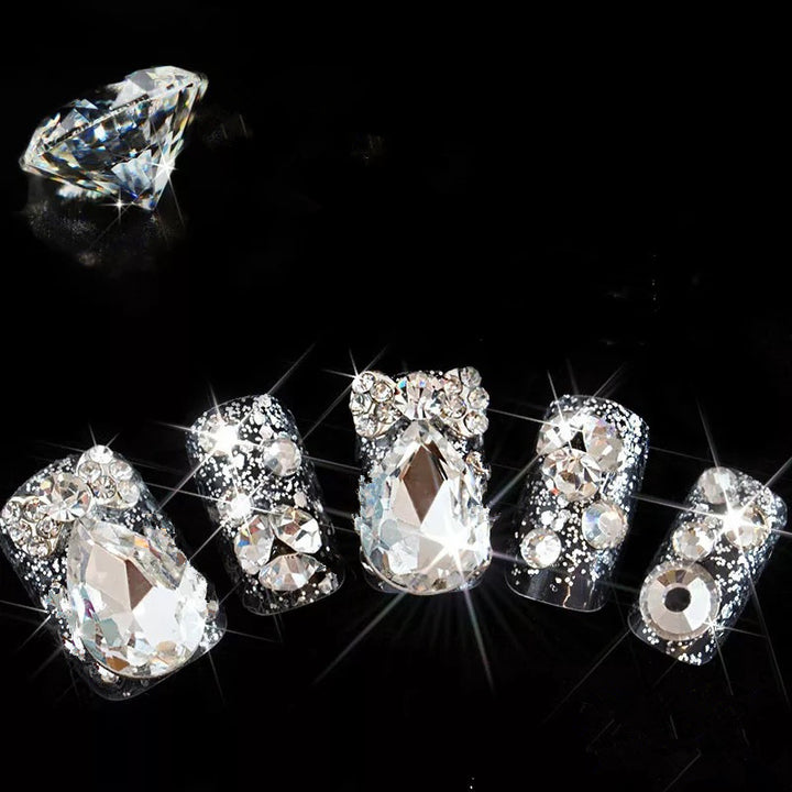 Nail art with glamorous rhinestone and glitter design Stornfield