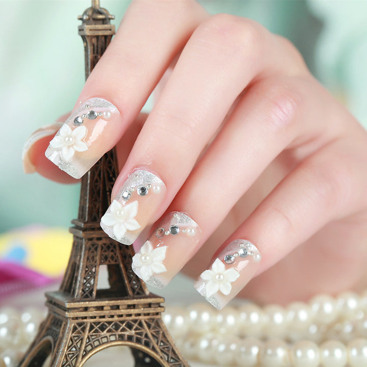 Artificial nails with delicate floral decorations Stornfield