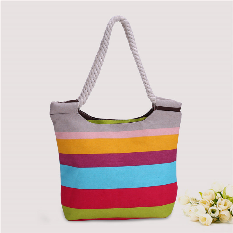 Beach bag made of durable canvas with colorful striped pattern Stornfield