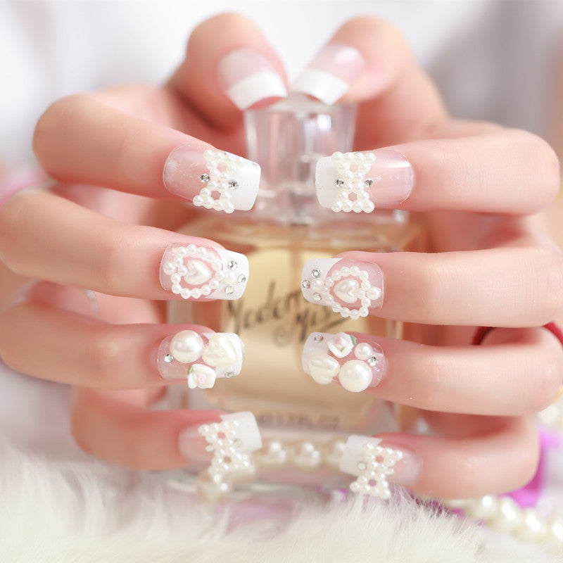 Artificial nails with delicate floral decorations Stornfield