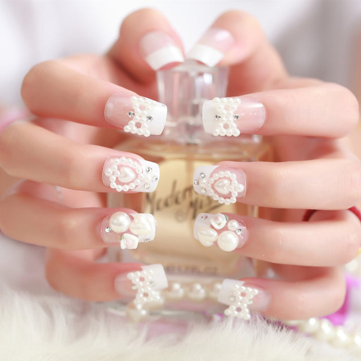Artificial nails with delicate floral decorations Stornfield
