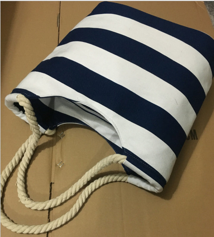 Beach bag made of durable canvas with colorful striped pattern Stornfield