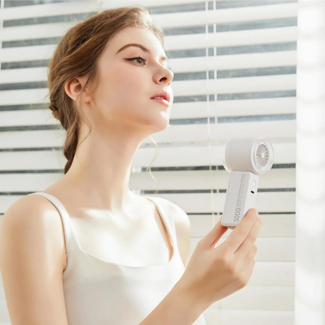 Compact High-Speed Handheld Fan with Digital Display - USB Rechargeable, 5 Speeds | Stornfield