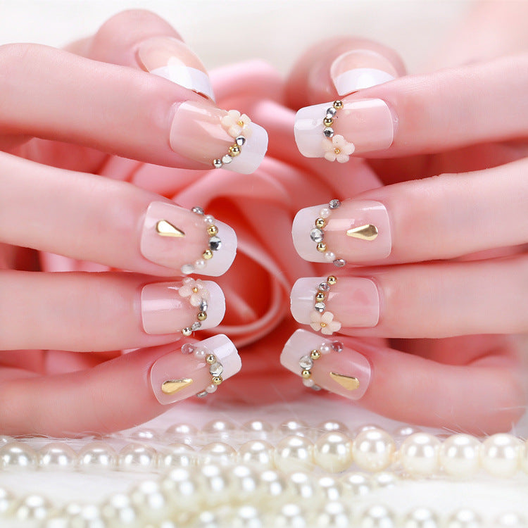 Artificial nails with delicate floral decorations Stornfield