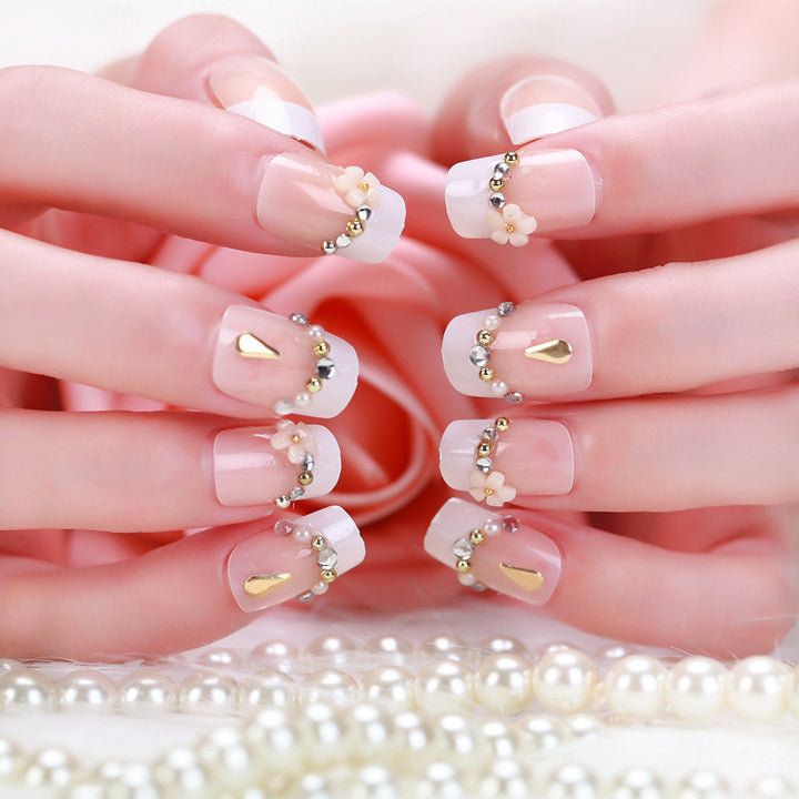 Artificial nails with delicate floral decorations Stornfield