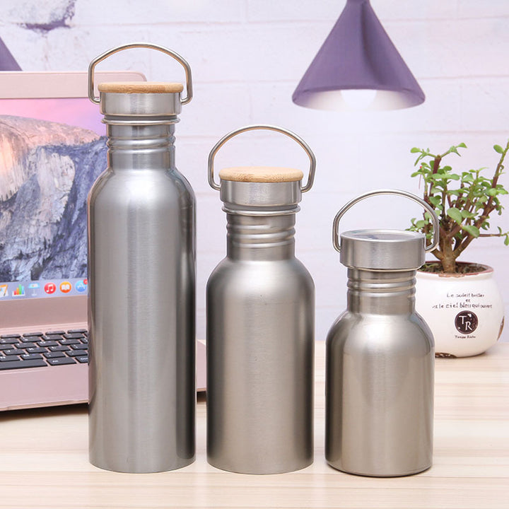 Ladies Elegant Stainless Steel Drinking Bottle with Sustainable Wood Cap Stornfield