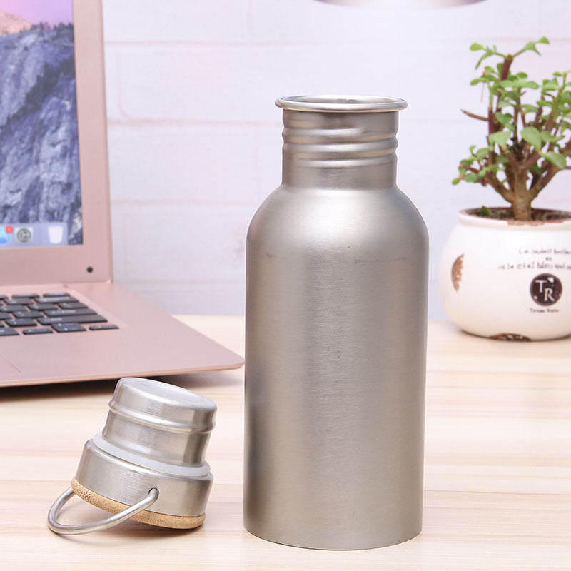 Ladies Elegant Stainless Steel Drinking Bottle with Sustainable Wood Cap Stornfield