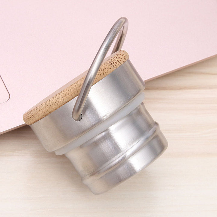 Ladies Elegant Stainless Steel Drinking Bottle with Sustainable Wood Cap Stornfield
