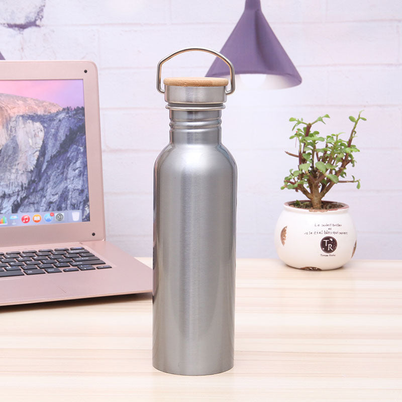 Ladies Elegant Stainless Steel Drinking Bottle with Sustainable Wood Cap Stornfield