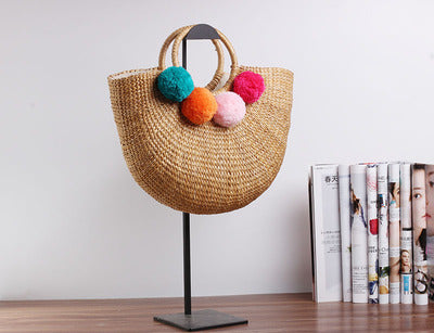 Handcrafted straw bag with colorful tassels Stornfield