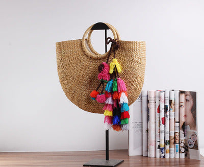 Handcrafted straw bag with colorful tassels Stornfield