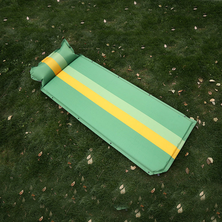 self-inflating camping sleeping pad with integrated pillow and insulated foam core Stornfield